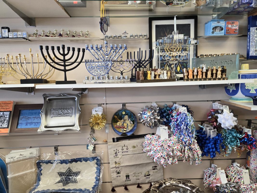selection of various styles of menorahs. traditional, whimsical cats and dogs menorahs